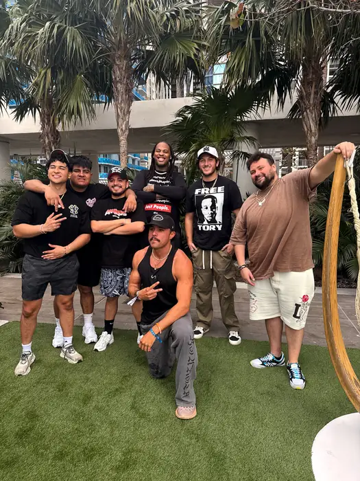 Group photographed outdoors at a South Florida community event