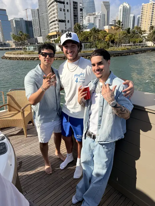 Group on the waterfront with the Miami skyline behind them
