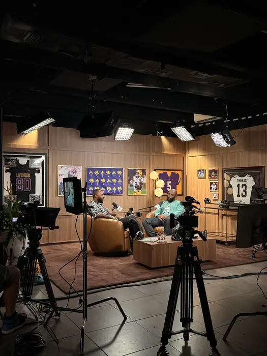 Camera and lighting setup on a media production set
